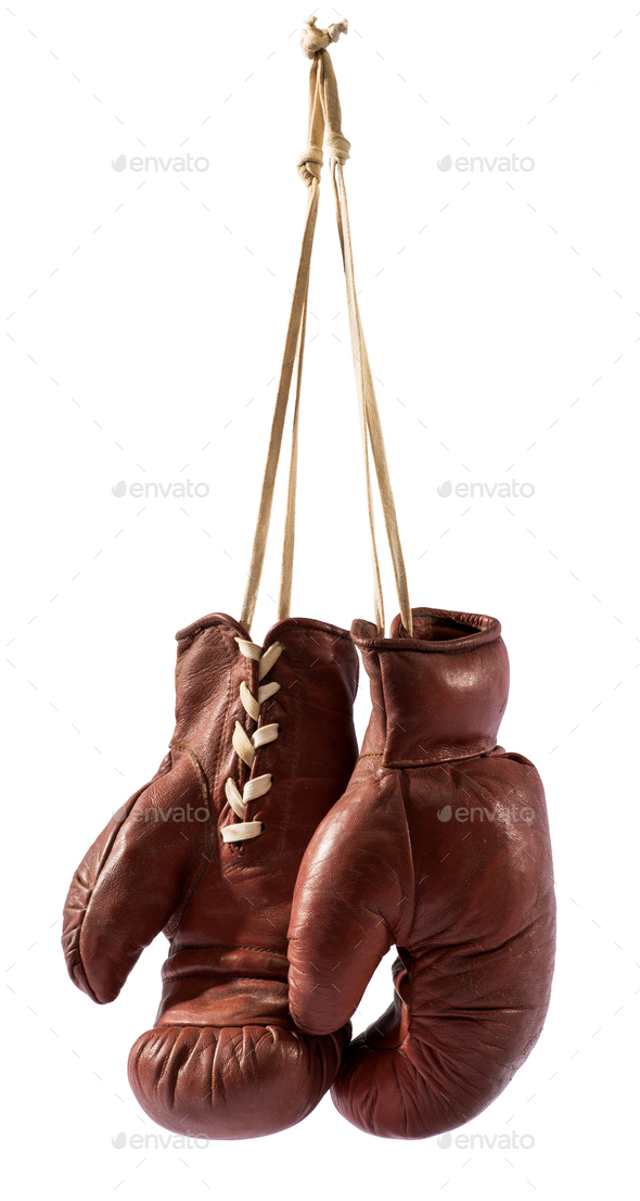 Boxing gloves hanging against white background Stock Photo by Photology75